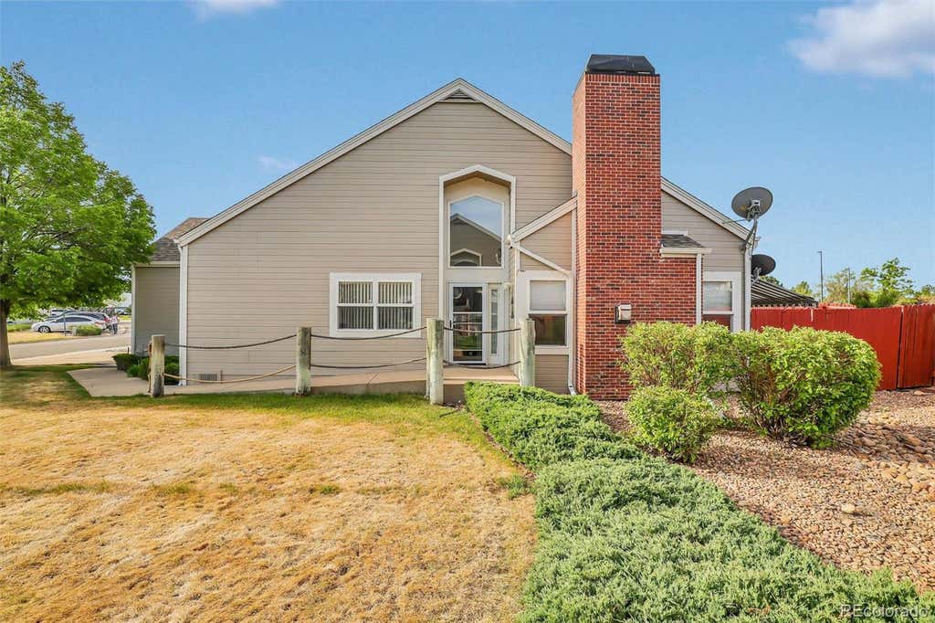 Photo of 15555 E 40th Avenue #7, Denver, CO 80239 (MLS # 6358038)