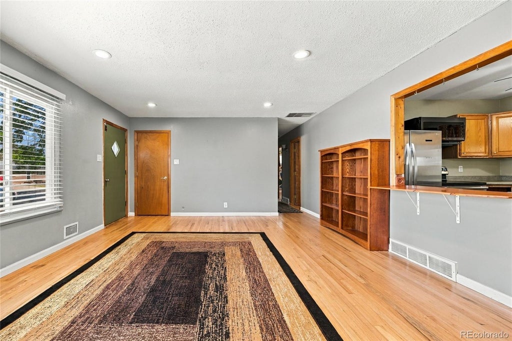 Photo of 7090 W Iowa Avenue, Denver, CO 80232 (MLS # 6811850)