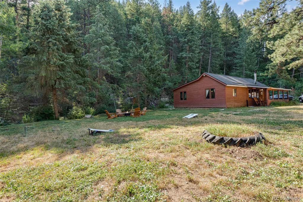 Photo of 10690 S Deer Creek Road, Littleton, CO 80127 (MLS # 7419220)