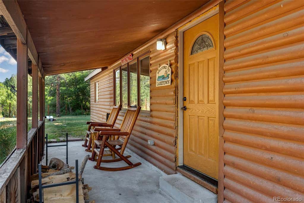 Photo of 10690 S Deer Creek Road, Littleton, CO 80127 (MLS # 7419220)