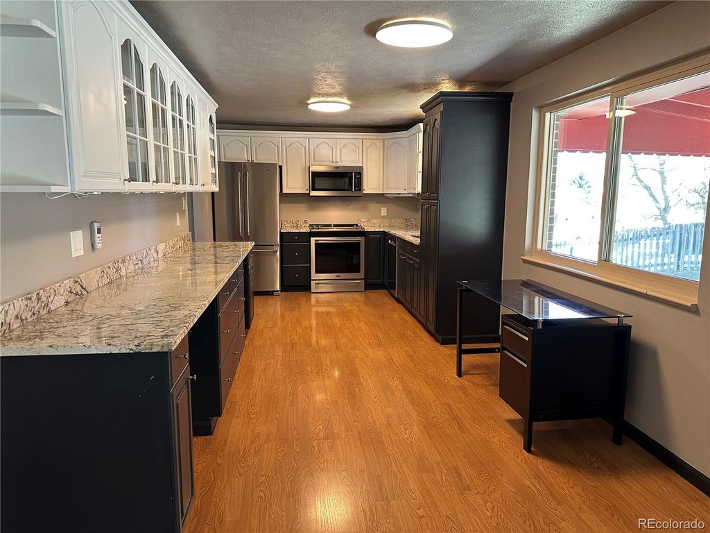 Photo of 12720 W 6th Place, Lakewood, CO 80401 (MLS # 4649044)