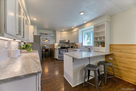 Photo of 6762 Beech Drive, Arvada, CO 80004 (MLS # 6158596)