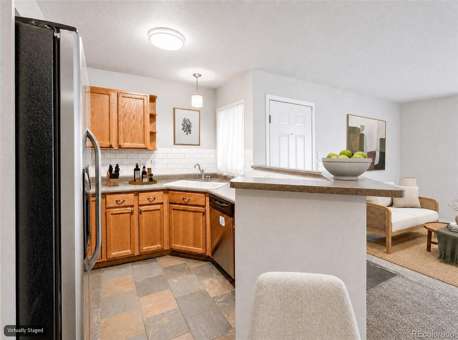 10734 W 63rd Place 104