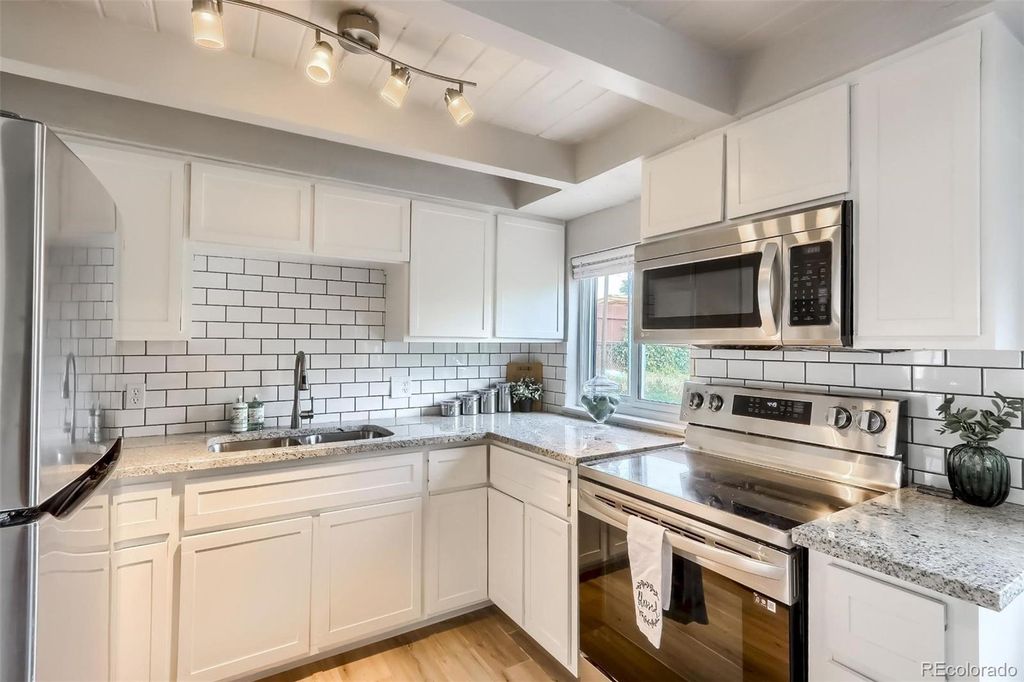 Photo of 4172 S Eliot Street, Englewood, CO 80110 (MLS # 2264393)