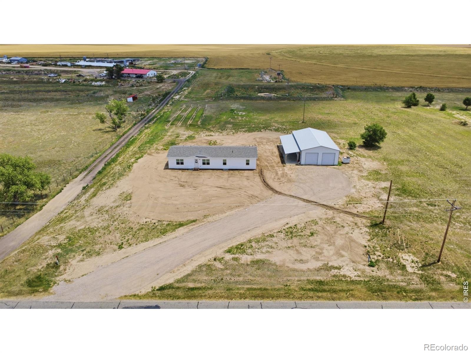 Photo 1 of 32 — 2420 County Road 4, Wiggins, CO 80654