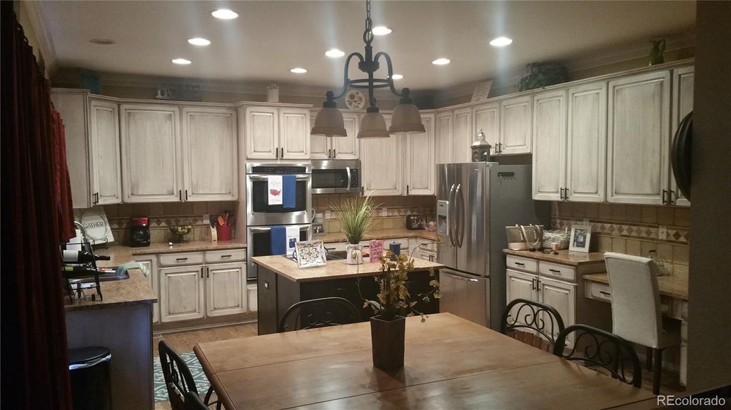 Photo of 10078 Brisbane Way, Littleton, CO 80130 (MLS # 3001219)