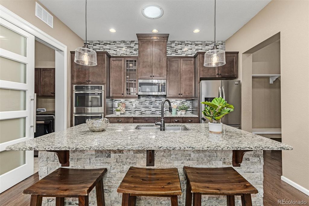 Photo of 16605 W 85th Lane #B, Arvada, CO 80007 (MLS # 7265137)