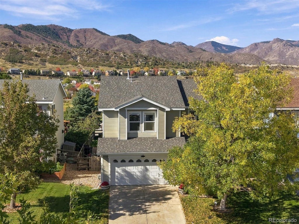Photo of 9735 Marmot Ridge Circle, Littleton, CO 80125 (MLS # 9715249)