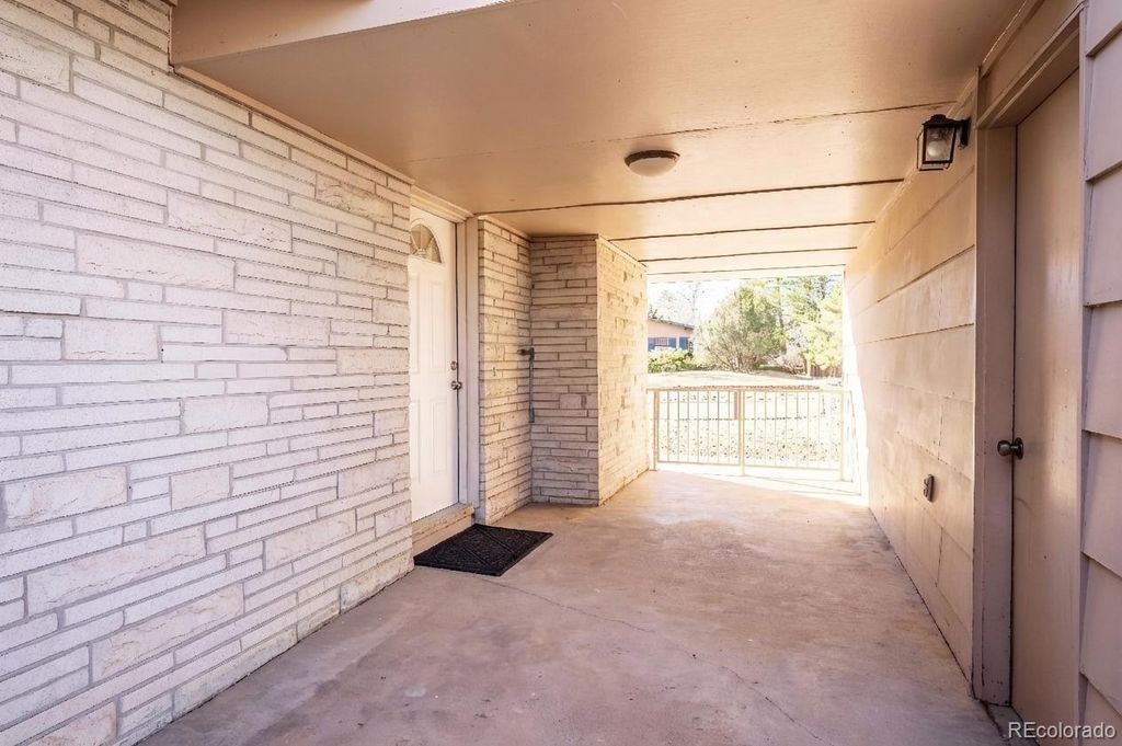 Photo of 6040 W Elmhurst Drive, Littleton, CO 80128 (MLS # 3447476)