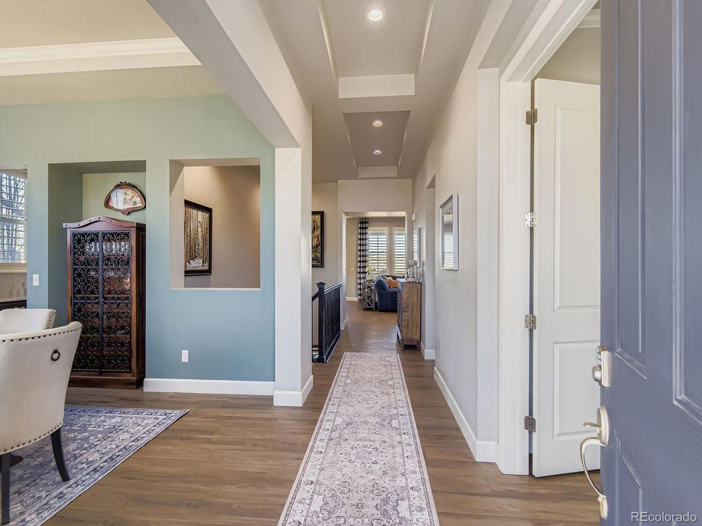 Photo of 7941 Piney River Avenue, Littleton, CO 80125 (MLS # 3884129)