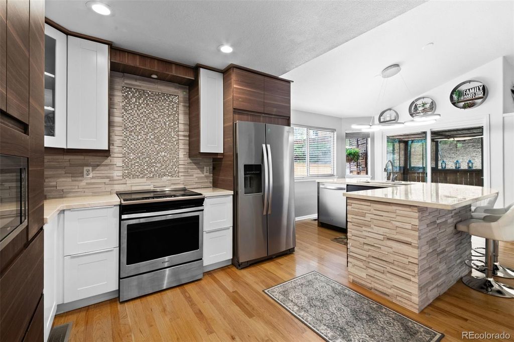 Photo of 9235 W Hinsdale Place, Littleton, CO 80128 (MLS # 3964101)