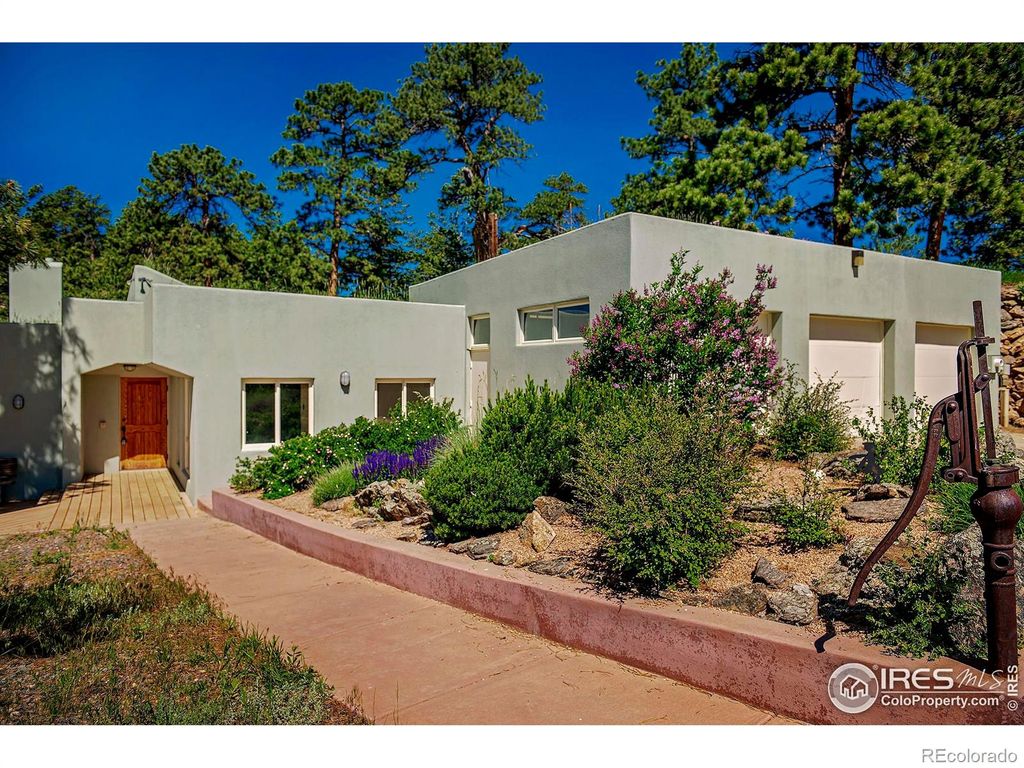Photo of 3884 Douglas Mountain Drive, Golden, CO 80403 (MLS # IR1038757)