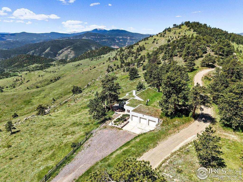 Photo of 3884 Douglas Mountain Drive, Golden, CO 80403 (MLS # IR1038757)