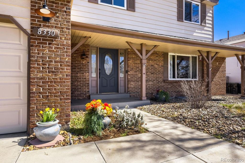 Photo of 8330 Garland Drive, Arvada, CO 80005 (MLS # 3715901)