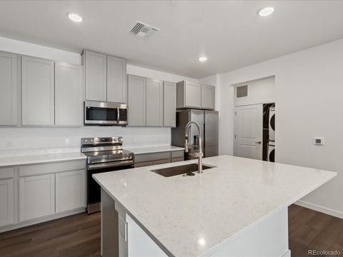 Photo of 6153 N Ceylon Street #206, Denver, CO 80249 (MLS # 2378644)