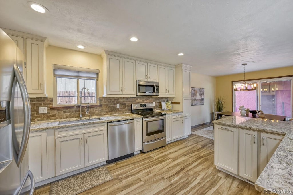 Photo of 6225 E Mississippi Avenue, Denver, CO 80224 (MLS # 8876750)