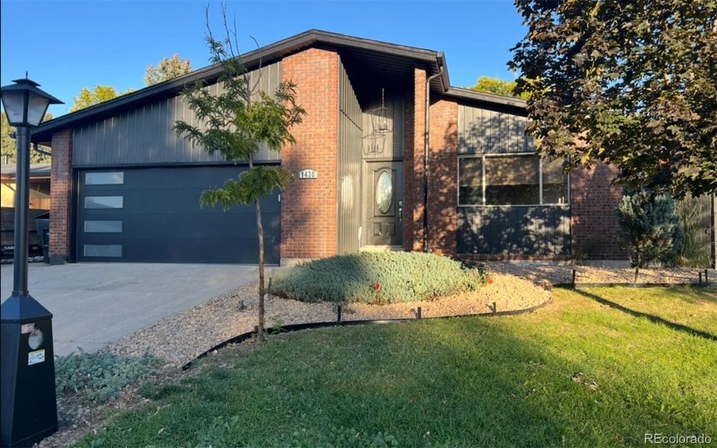 Photo of 1430 Mount Evans Drive, Longmont, CO 80504 (MLS # 3835089)