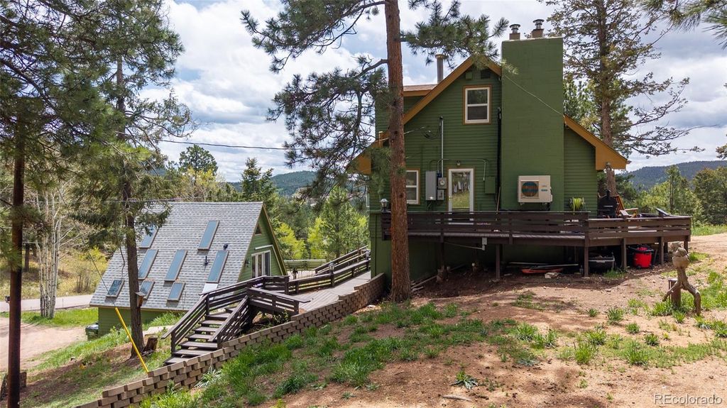Photo of 9759 Fallen Rock Road, Conifer, CO 80433 (MLS # 2612632)
