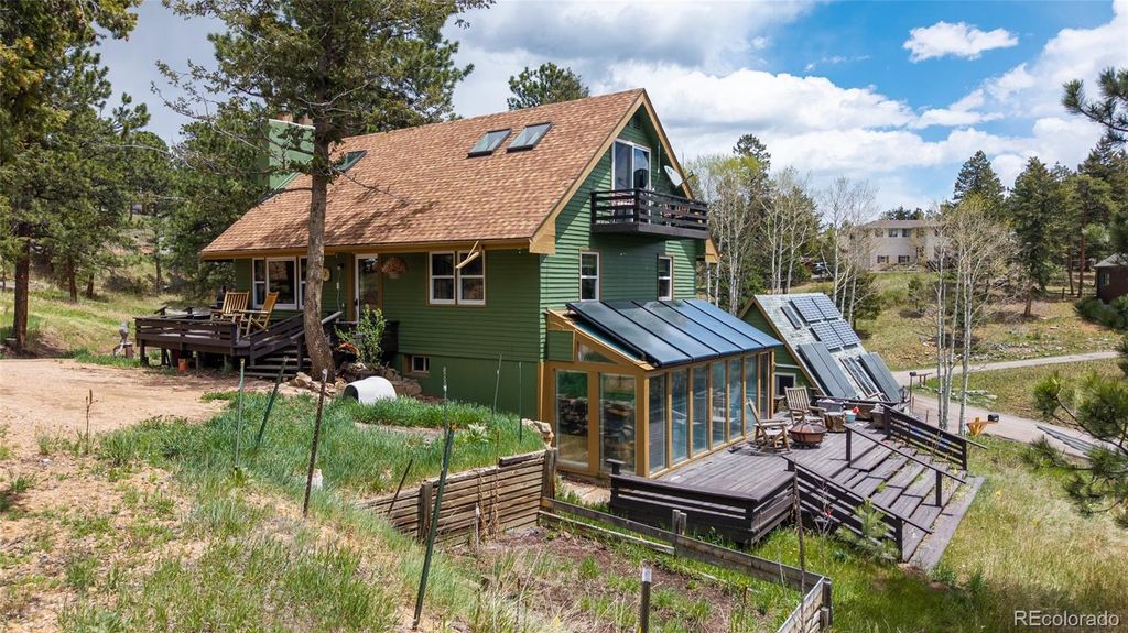 Photo of 9759 Fallen Rock Road, Conifer, CO 80433 (MLS # 2612632)