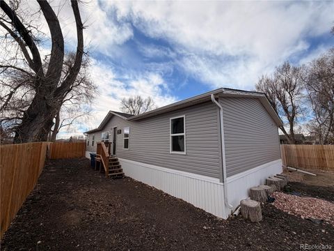 Photo of 811 Plum Avenue, Lochbuie, CO 80603 (MLS # 4122192)