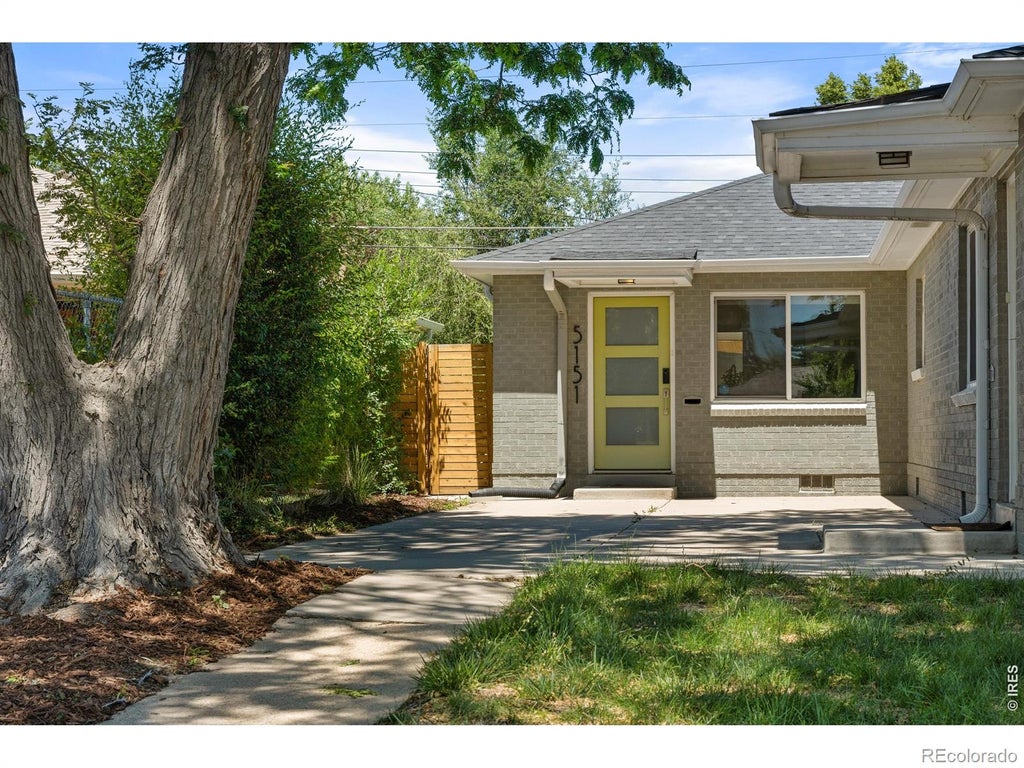 Photo of 5151 E Thrill Place, Denver, CO 80207 (MLS # IR1061971)