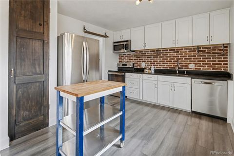 Photo of 9142 Oberon Road, Arvada, CO 80004 (MLS # 2695689)