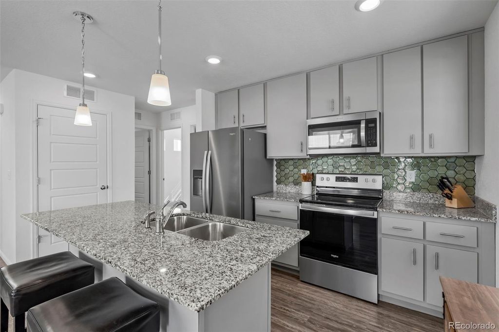 Photo of 18227 E 51st Avenue, Denver, CO 80249 (MLS # 8184015)