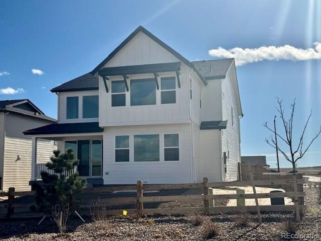 Photo of 16867 W 92nd Drive, Arvada, CO 80007 (MLS # 8456602)