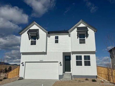 Photo of 16867 W 92nd Drive, Arvada, CO 80007 (MLS # 8456602)