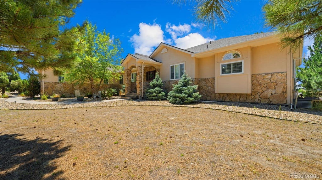 Photo of 990 Glade Gulch Road, Castle Rock, CO 80104 (MLS # 7339858)