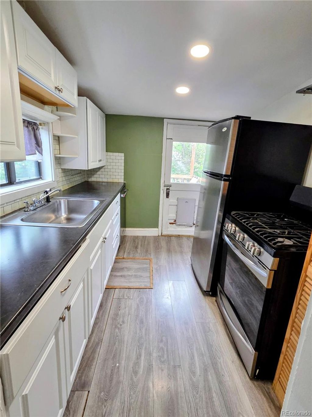 Photo of 11690 W Pleasant Avenue, Lakewood, CO 80401 (MLS # 9164817)