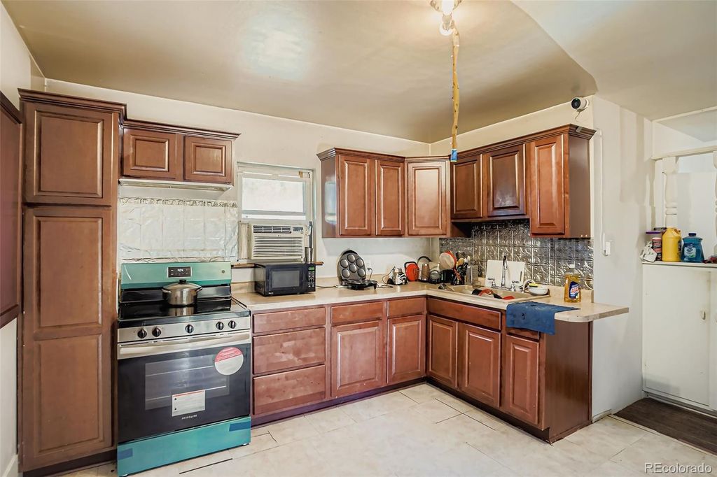 Photo of 2425 W College Avenue, Denver, CO 80219 (MLS # 2061798)