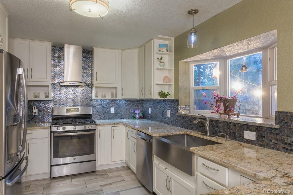 Photo of 2964 S Winona Court, Denver, CO 80236 (MLS # 3119892)