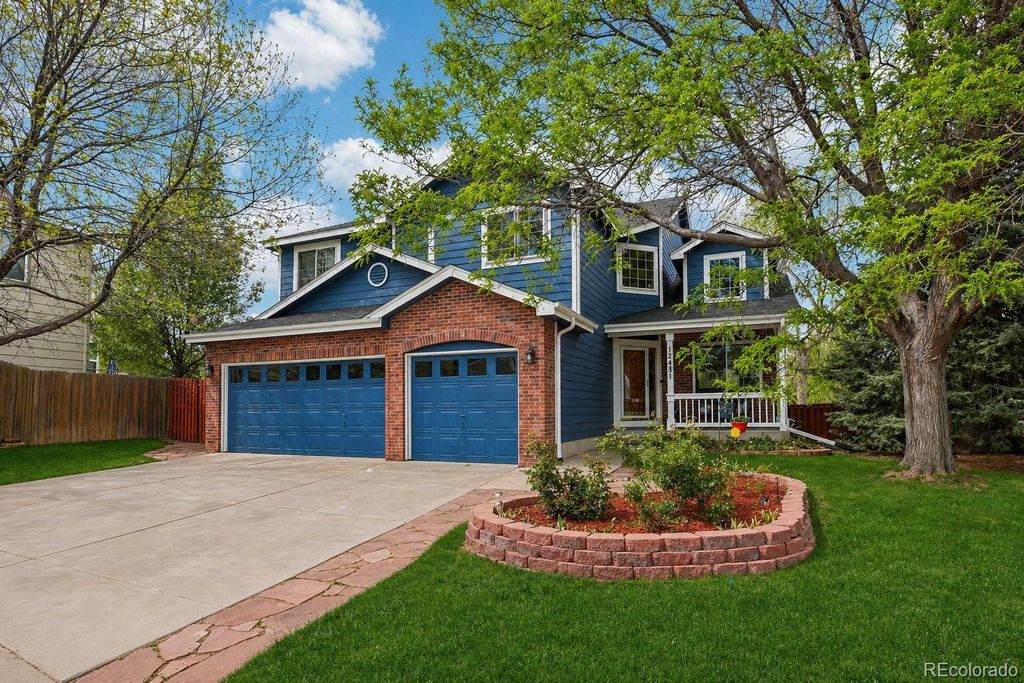 Photo of 12431 W 84th Circle, Arvada, CO 80005 (MLS # 2413255)