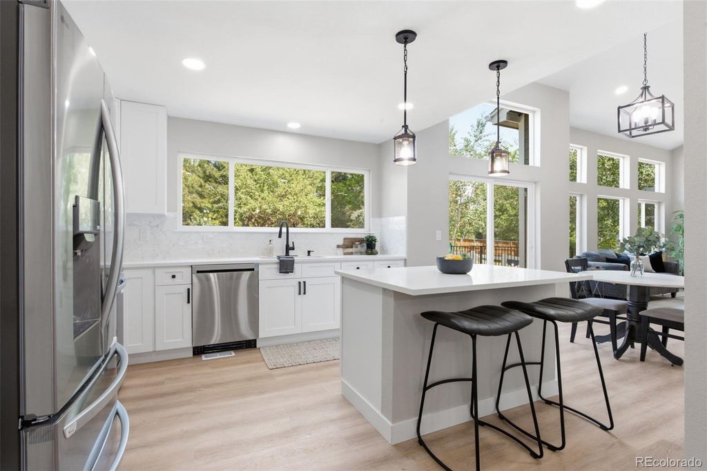 Photo of 10791 Trailrider Pass, Littleton, CO 80127 (MLS # 5108603)
