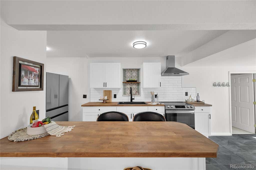 Photo of 575 S Clay Street, Denver, CO 80219 (MLS # 2273736)