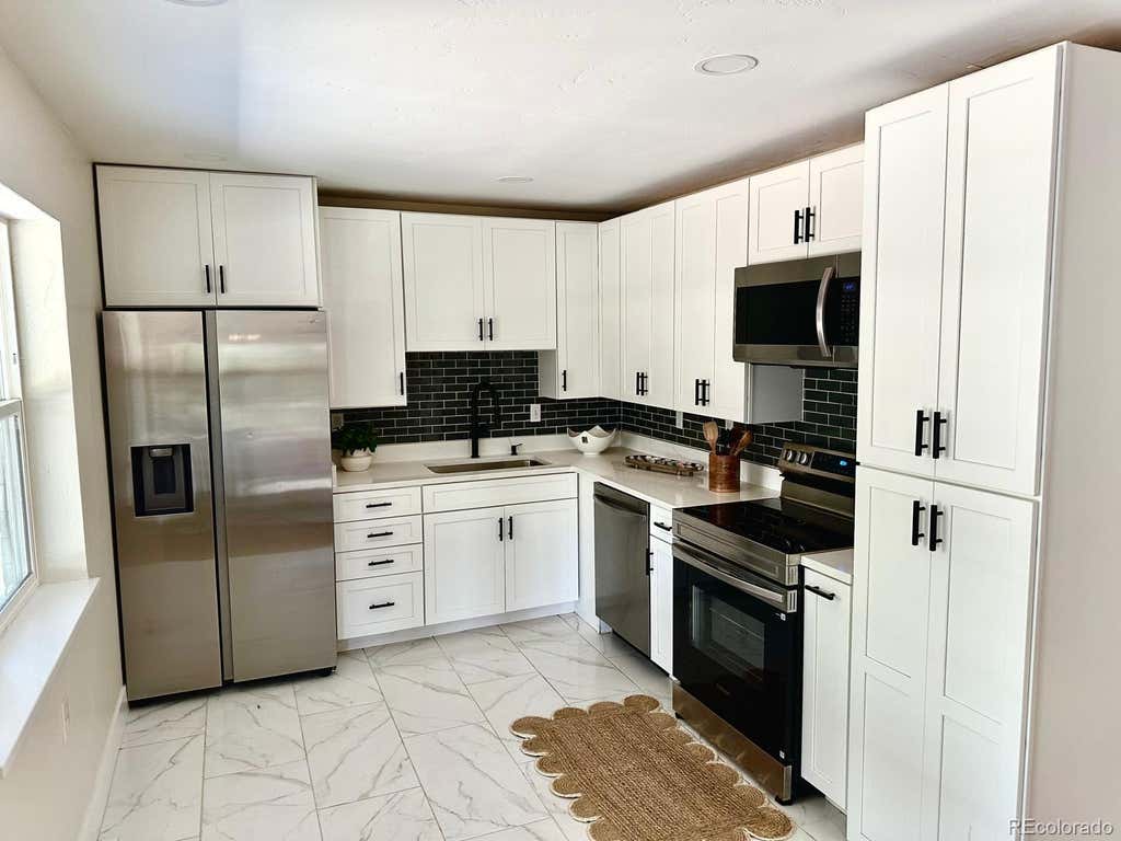 Photo of 647 S Jasmine Way, Denver, CO 80224 (MLS # 6359716)