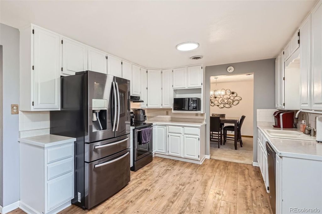 Photo of 11290 W 77th Drive, Arvada, CO 80005 (MLS # 7516923)