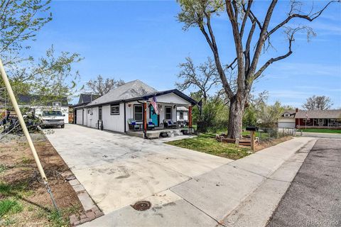 Photo of 8885 W 64th Place, Arvada, CO 80004 (MLS # 9222672)