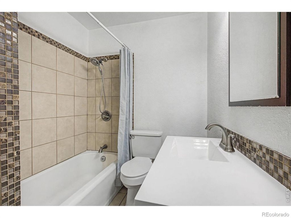 Photo of 1230 Hover Street, Longmont, CO 80501 (MLS # IR1053855)