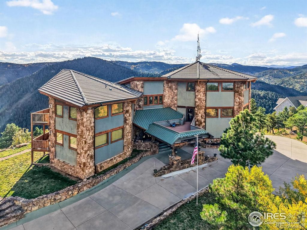 Photo of 14900 Elk Mountain Trail, Littleton, CO 80127 (MLS # IR1051997)