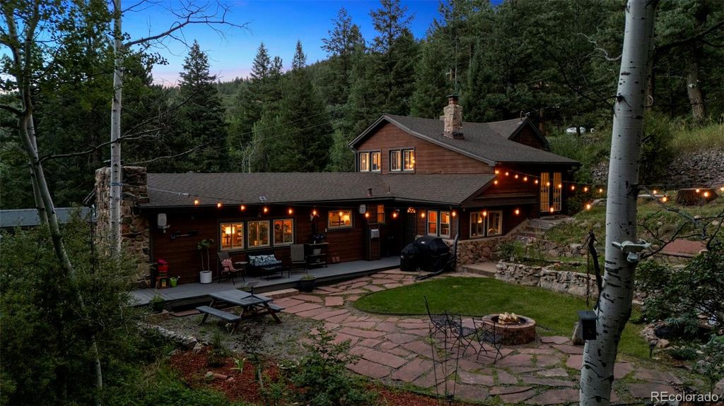 Photo of 11933 S Maxwell Hill Road, Littleton, CO 80127 (MLS # 7016764)