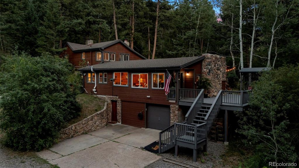 Photo of 11933 S Maxwell Hill Road, Littleton, CO 80127 (MLS # 7016764)