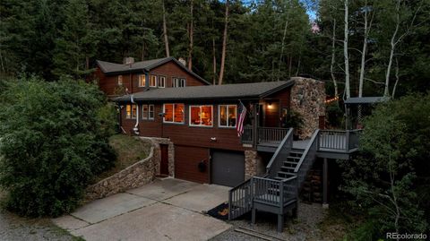 Photo of 11933 S Maxwell Hill Road, Littleton, CO 80127 (MLS # 7016764)