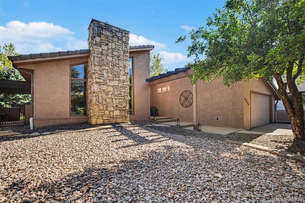 Photo of 10898 Snow Cloud Trail, Littleton, CO 80125 (MLS # 3858033)