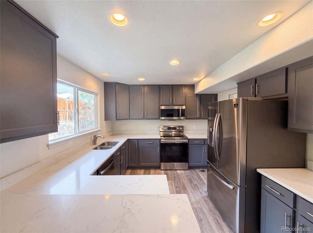 Photo of 7967 Canvasback Court, Littleton, CO 80125 (MLS # 8227143)