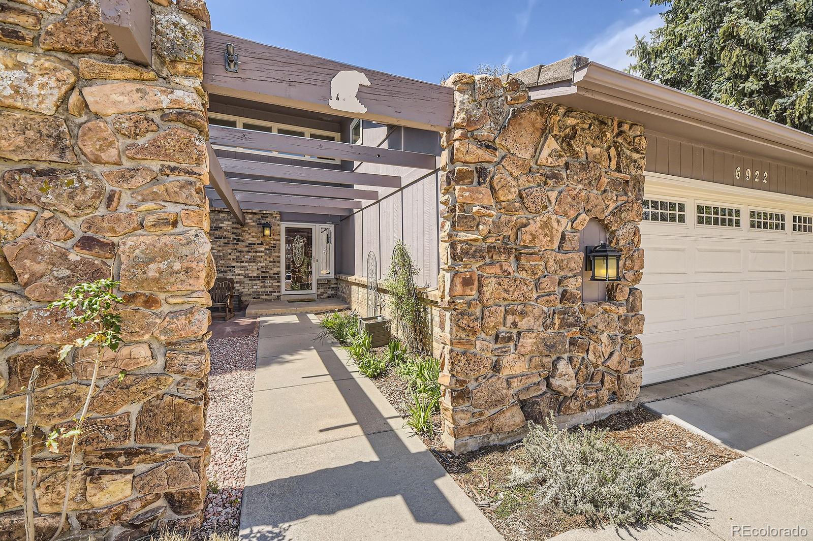 6922 W Walden Place