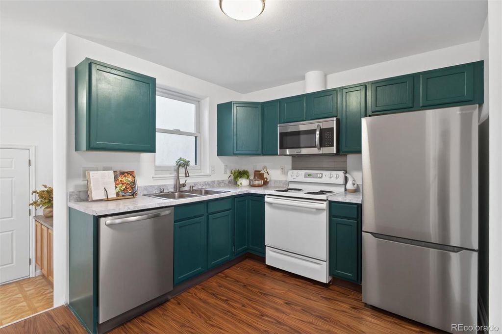 Photo of 1803 E 36th Avenue, Denver, CO 80205 (MLS # 2739130)