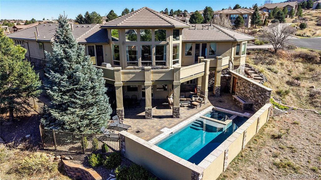 Photo of 11197 Explorers Run, Littleton, CO 80125 (MLS # 7552594)