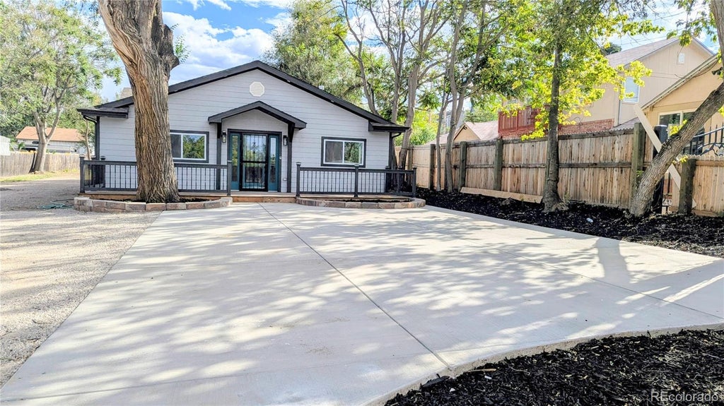 Photo of 2860 W Dartmouth Avenue, Denver, CO 80236 (MLS # 7292976)